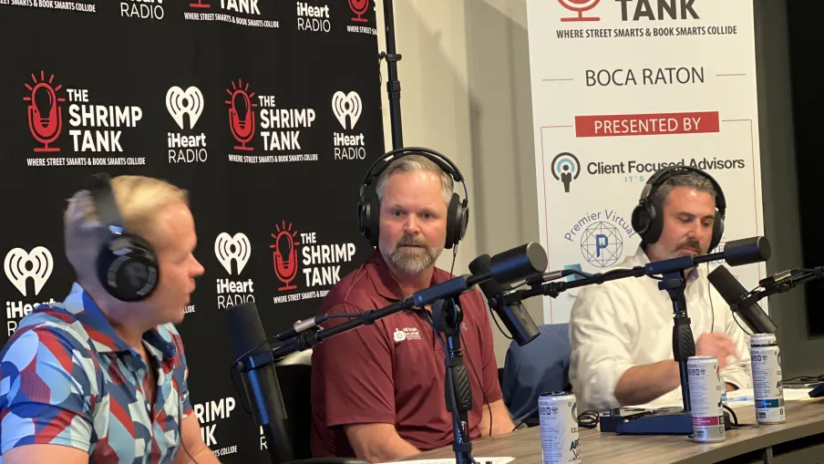 a group of men wearing headphones