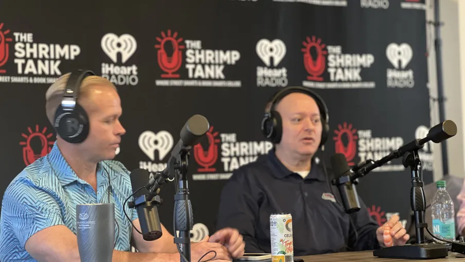 a couple of men wearing headphones