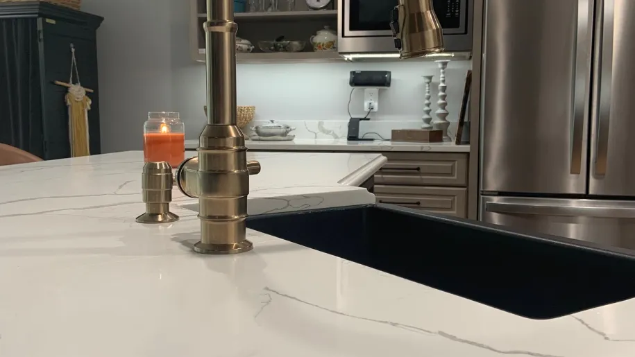 Brass faucet with quartz counters