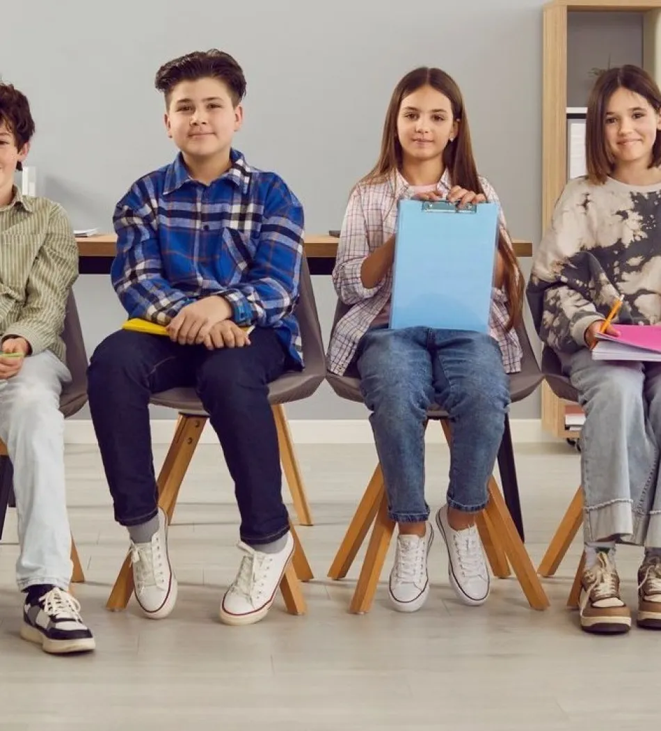 a group of people sitting in chairs