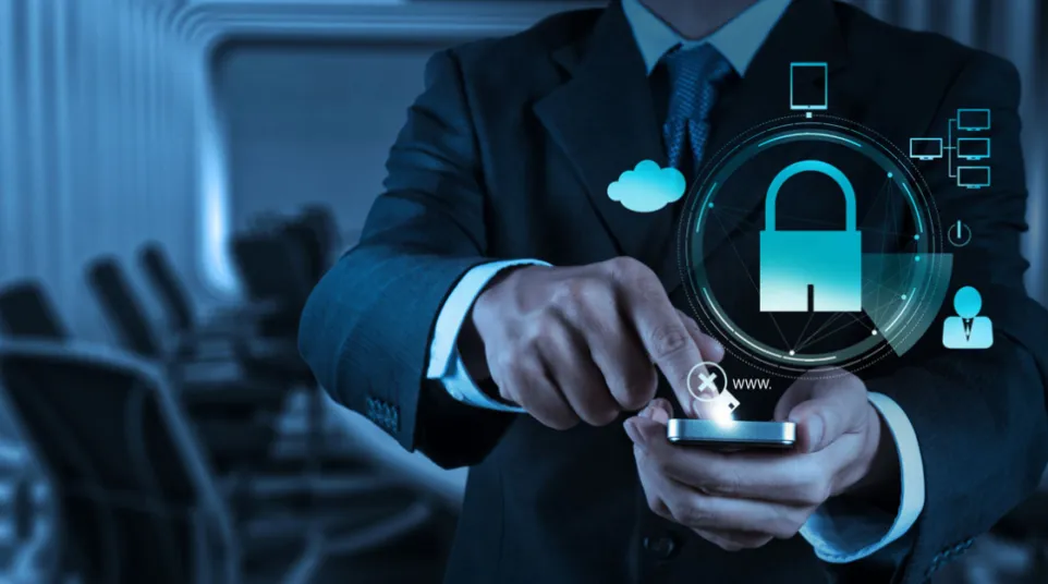 Businessman using smartphone with digital lock and security icons symbolizing mobile cybersecurity and data protection.