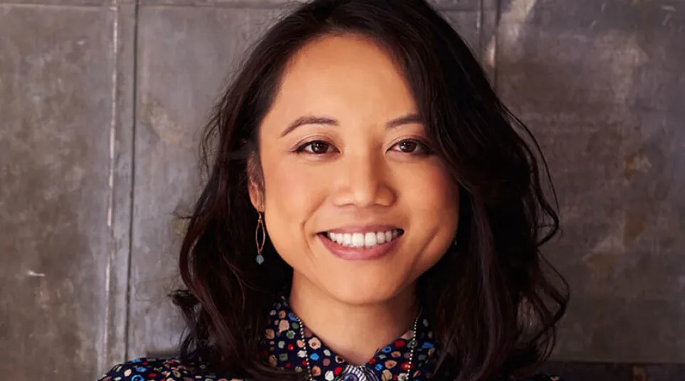 a woman smiling for the camera