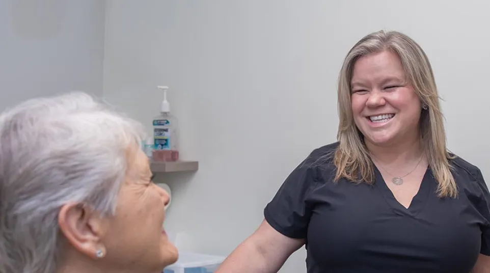 a man and a woman smiling