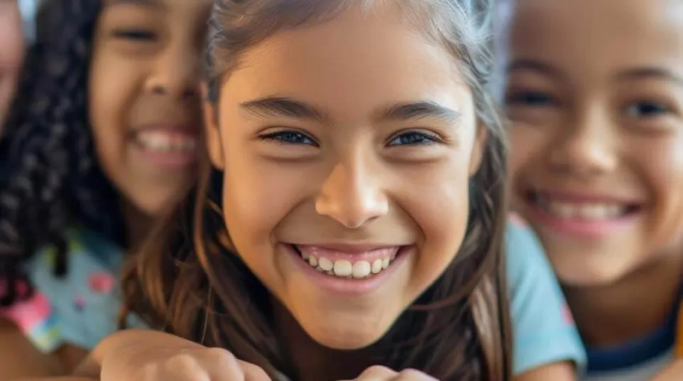 a group of girls smiling