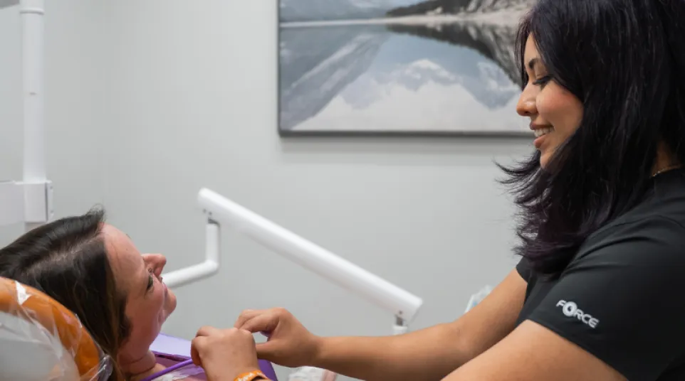a family smiling and laughing