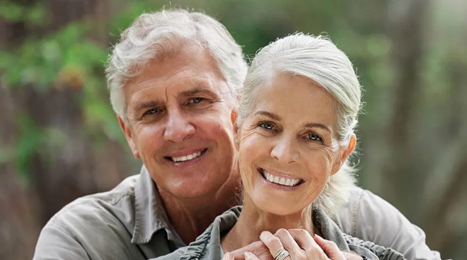 a man with his hands on his face