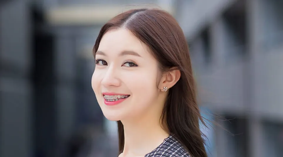 a woman smiling at the camera