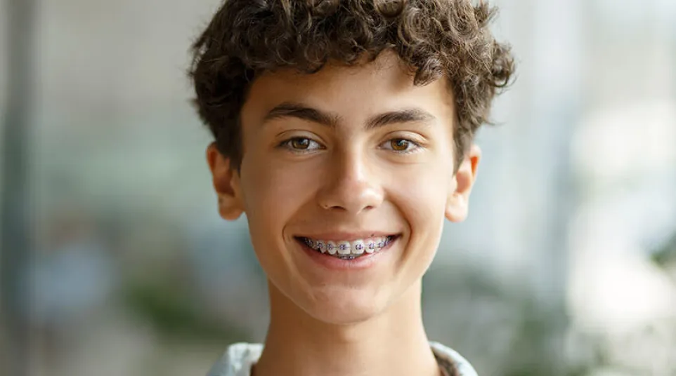 a person smiling for the camera