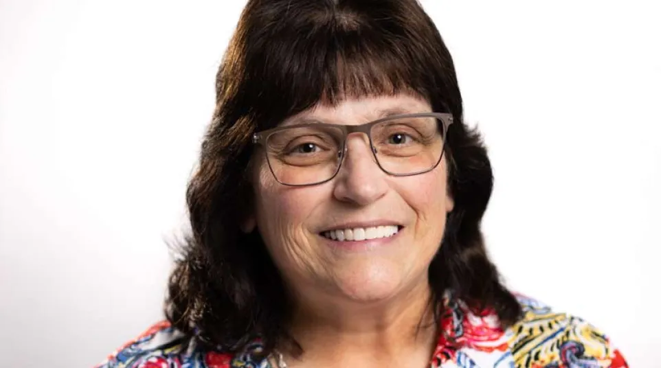 a person smiling outside