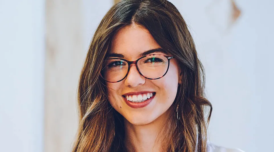 a woman wearing glasses
