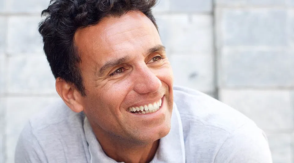 a man smiling for the camera