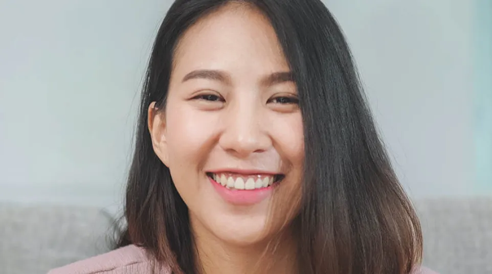 a woman smiling for the camera