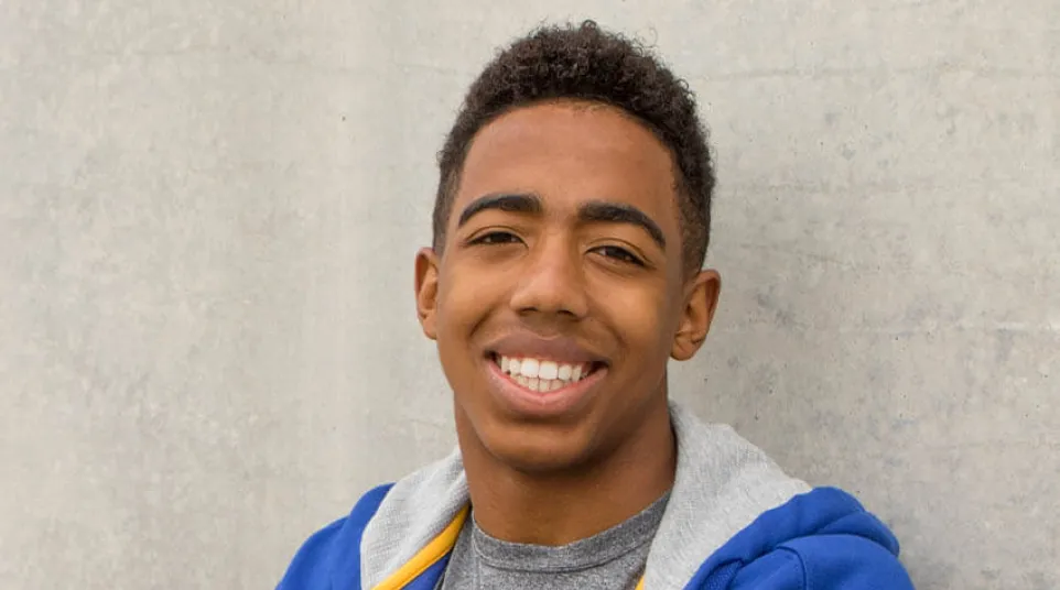 a person smiling for the camera