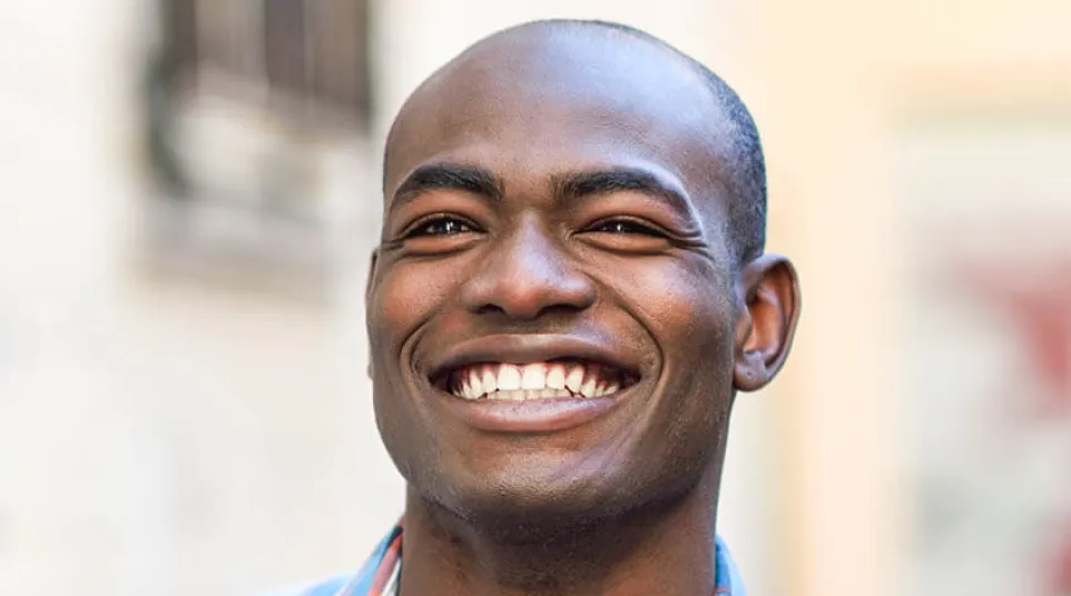 a man smiling for the camera
