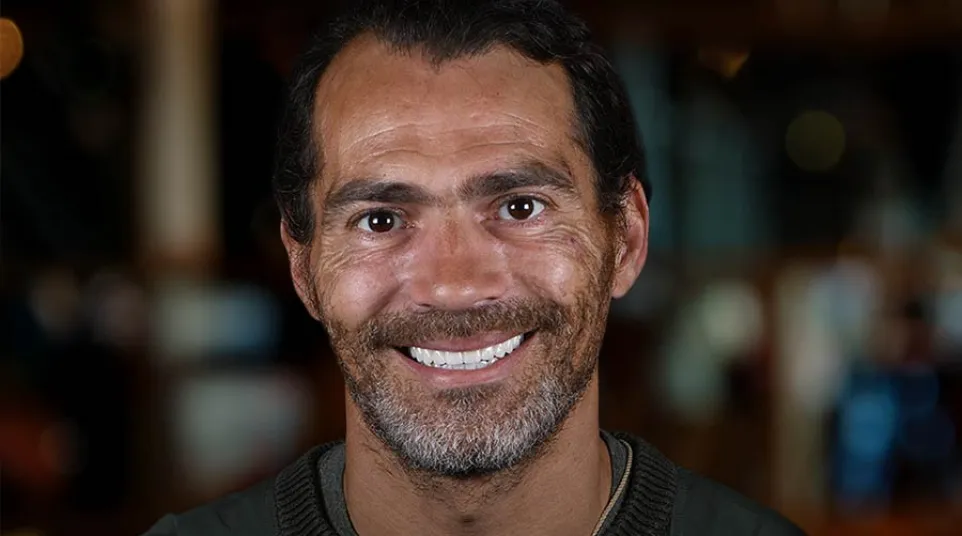 a man smiling for the camera