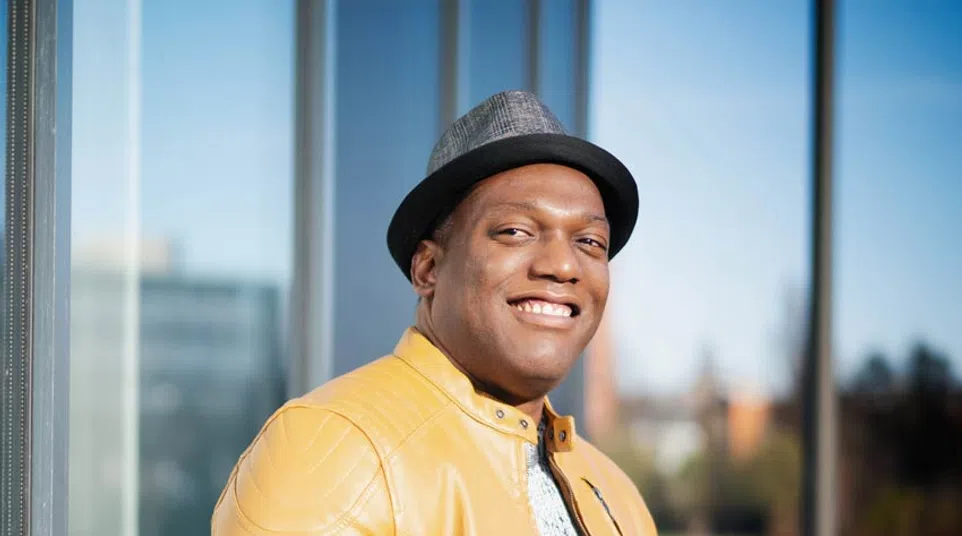a person smiling for the camera