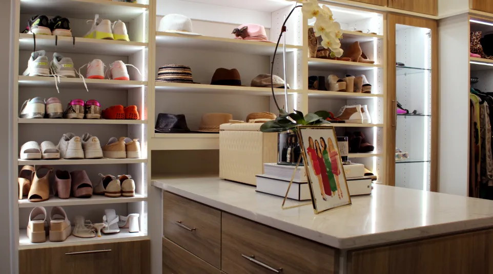 a kitchen with white cabinets