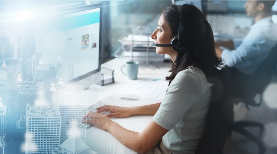 A call center agent assists customers with a headset, digitally connected to cityscape visuals.