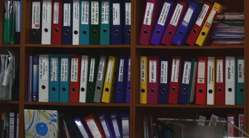 a shelf with many books on it