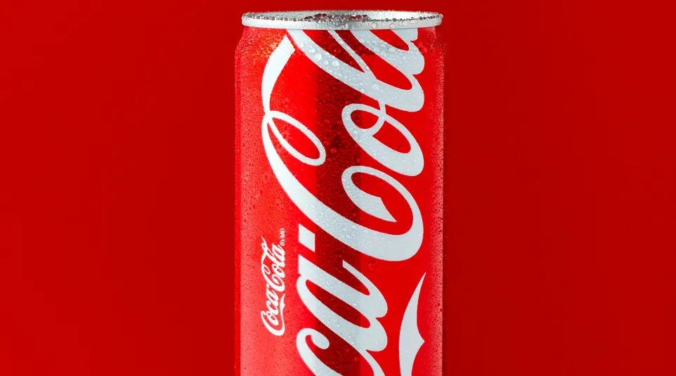 a red and white can of soda
