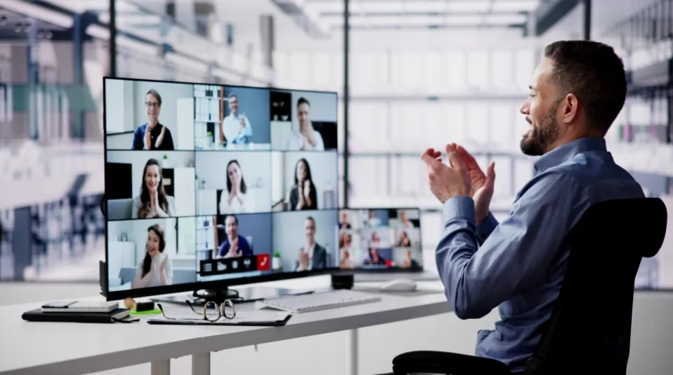 a man pointing at a screen