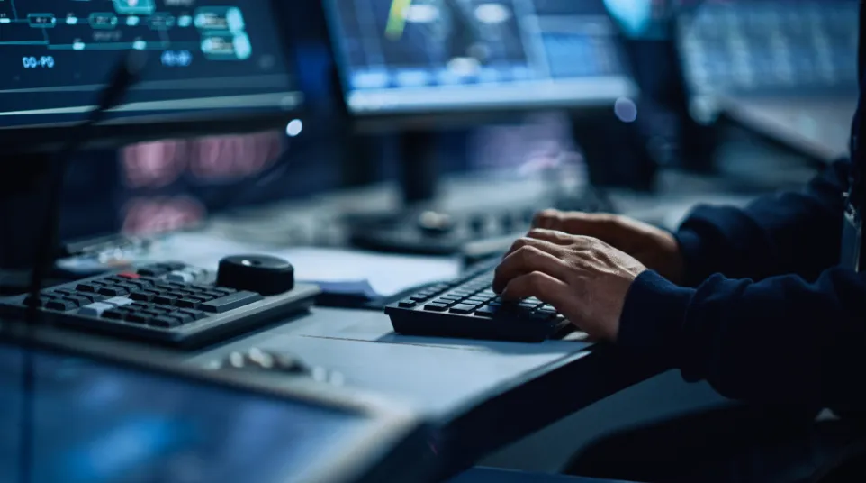 a close-up of a person typing on a keyboard