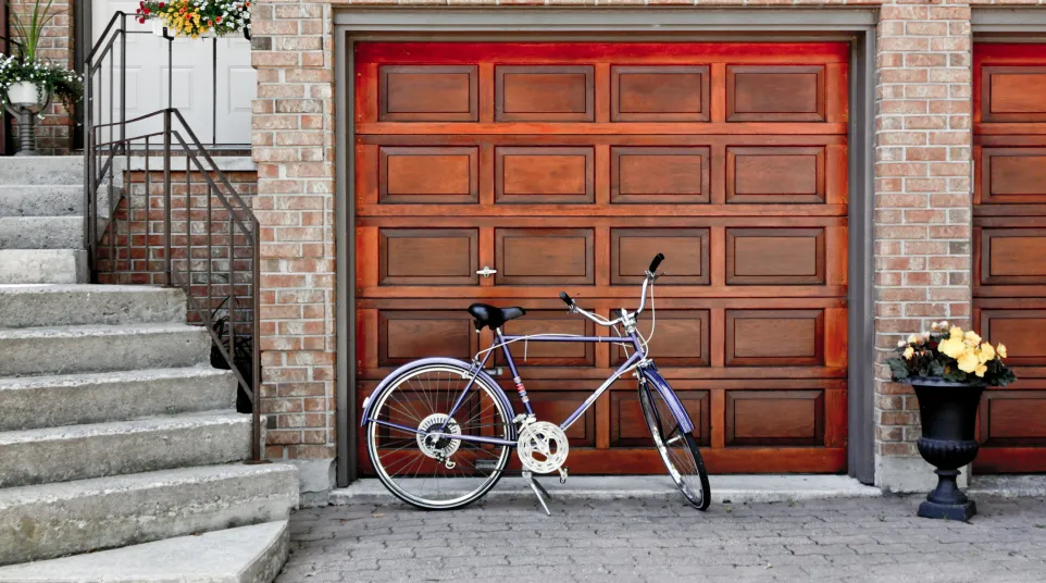 a bicycle parked in front of a door