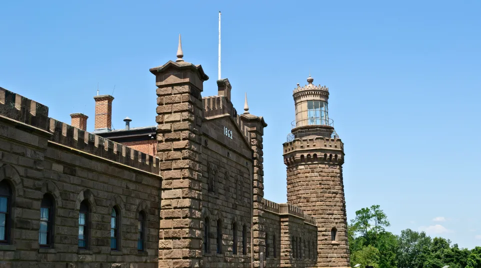 a large brick building with a tower