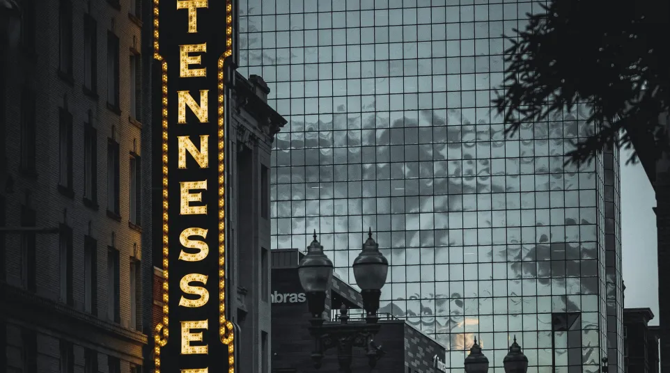 a city street with a large sign