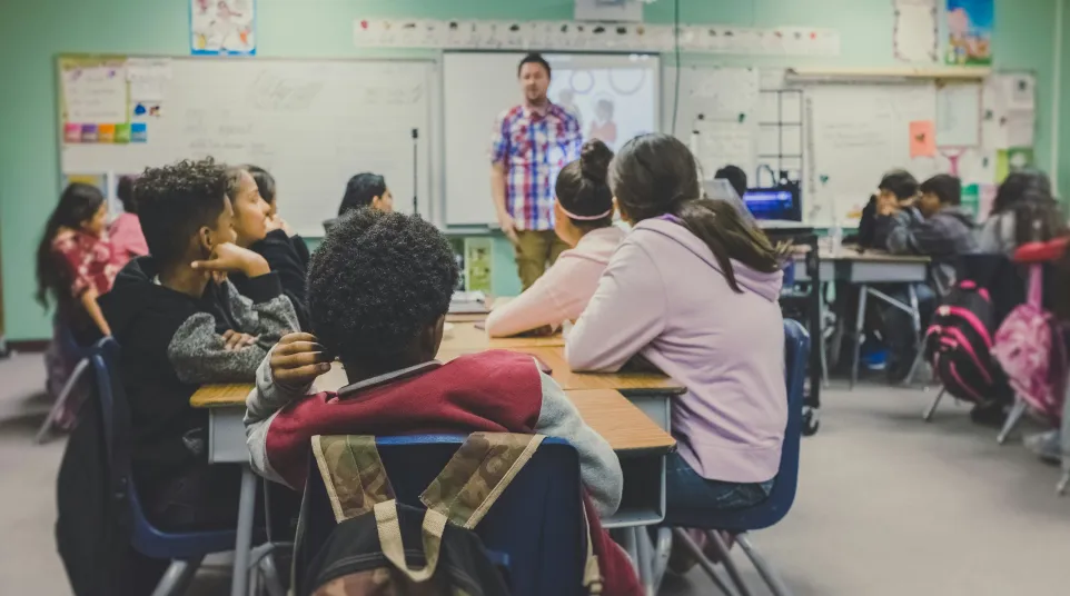 a group of people in a classroom