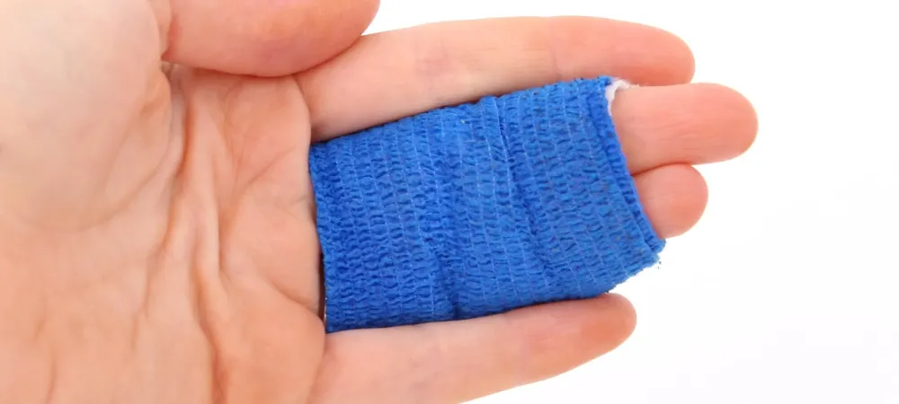 injured  hand with wound care.
