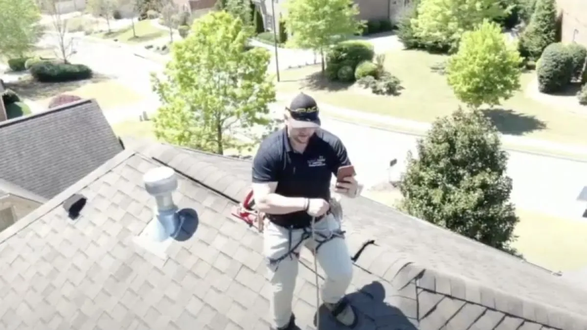 a man working on a roof