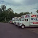 a line of white trucks