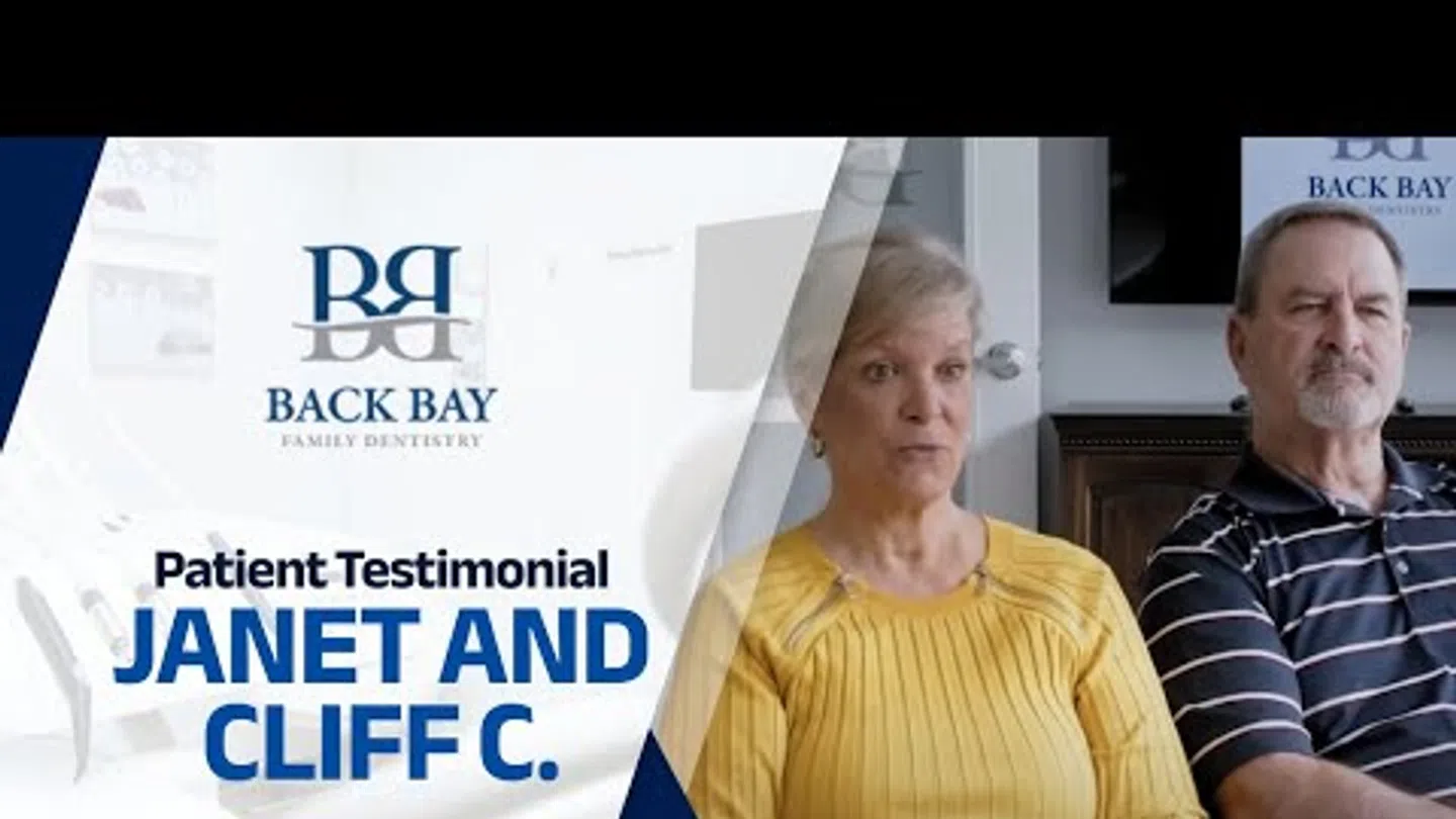 Janet and Cliff C. share a patient testimonial at Back Bay Family Dentistry with logo and text overlay.