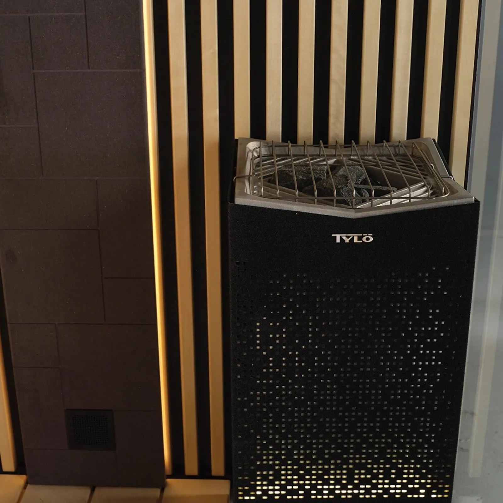 a black rectangular object with a vent