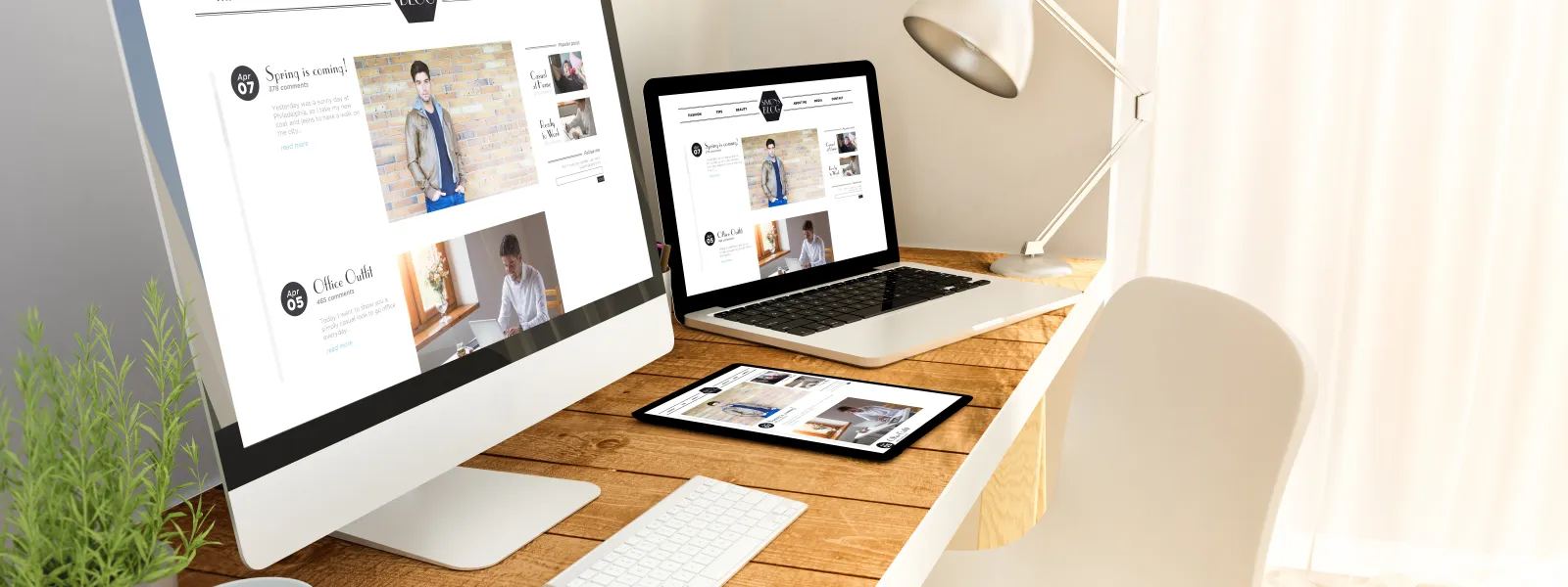 a desk with multiple electronic devices on the same website