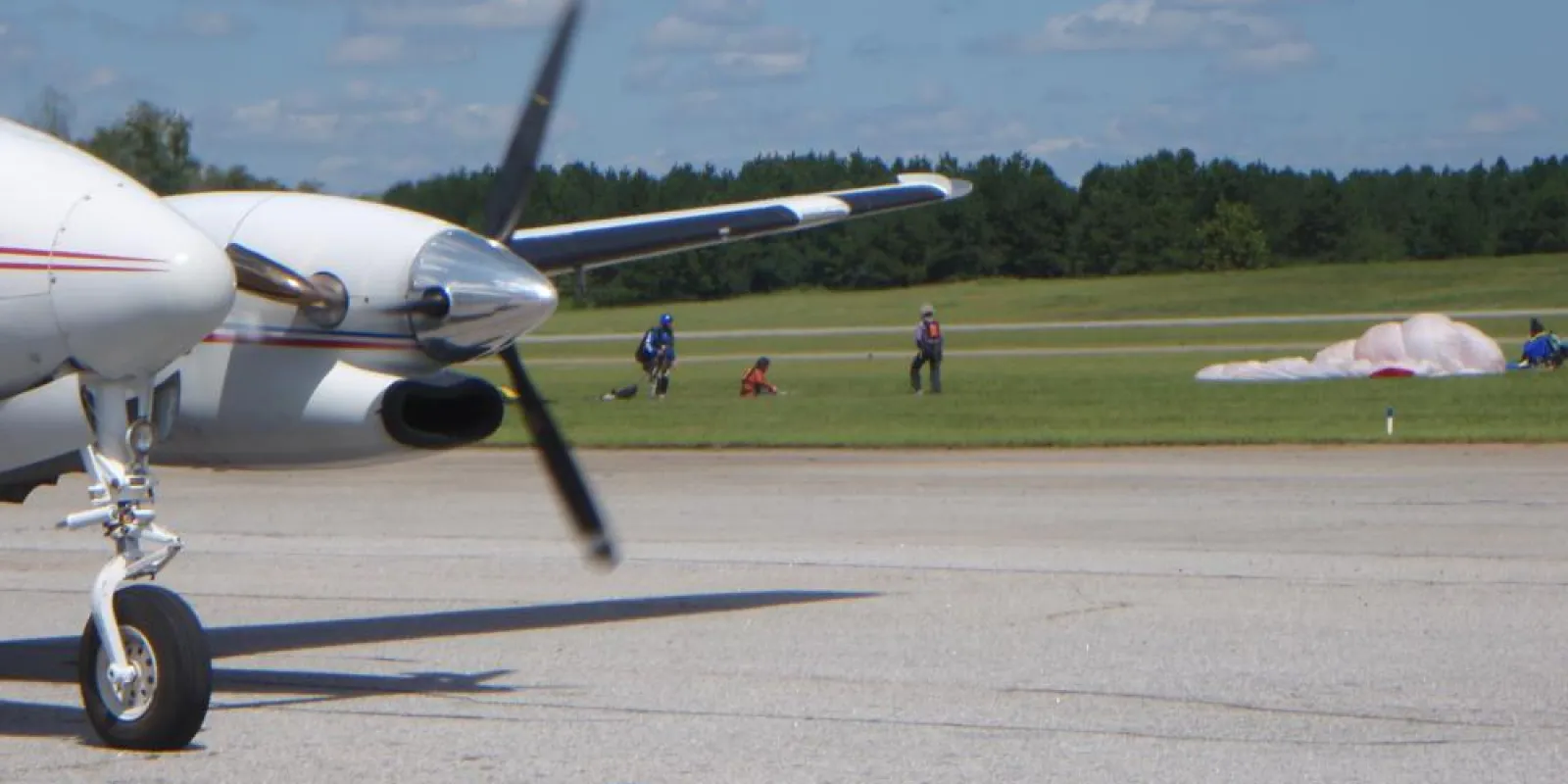 a small airplane sitting on top of a runway