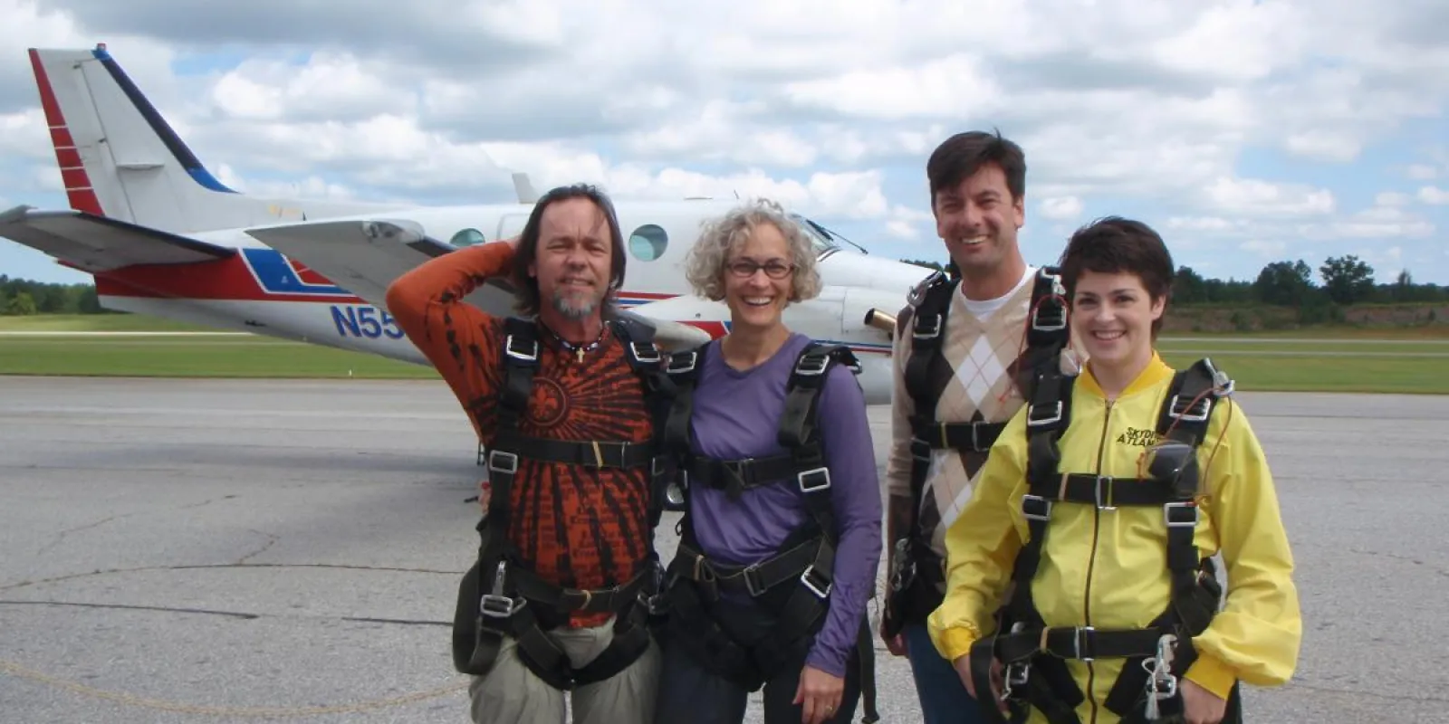 a group of people posing for the camera