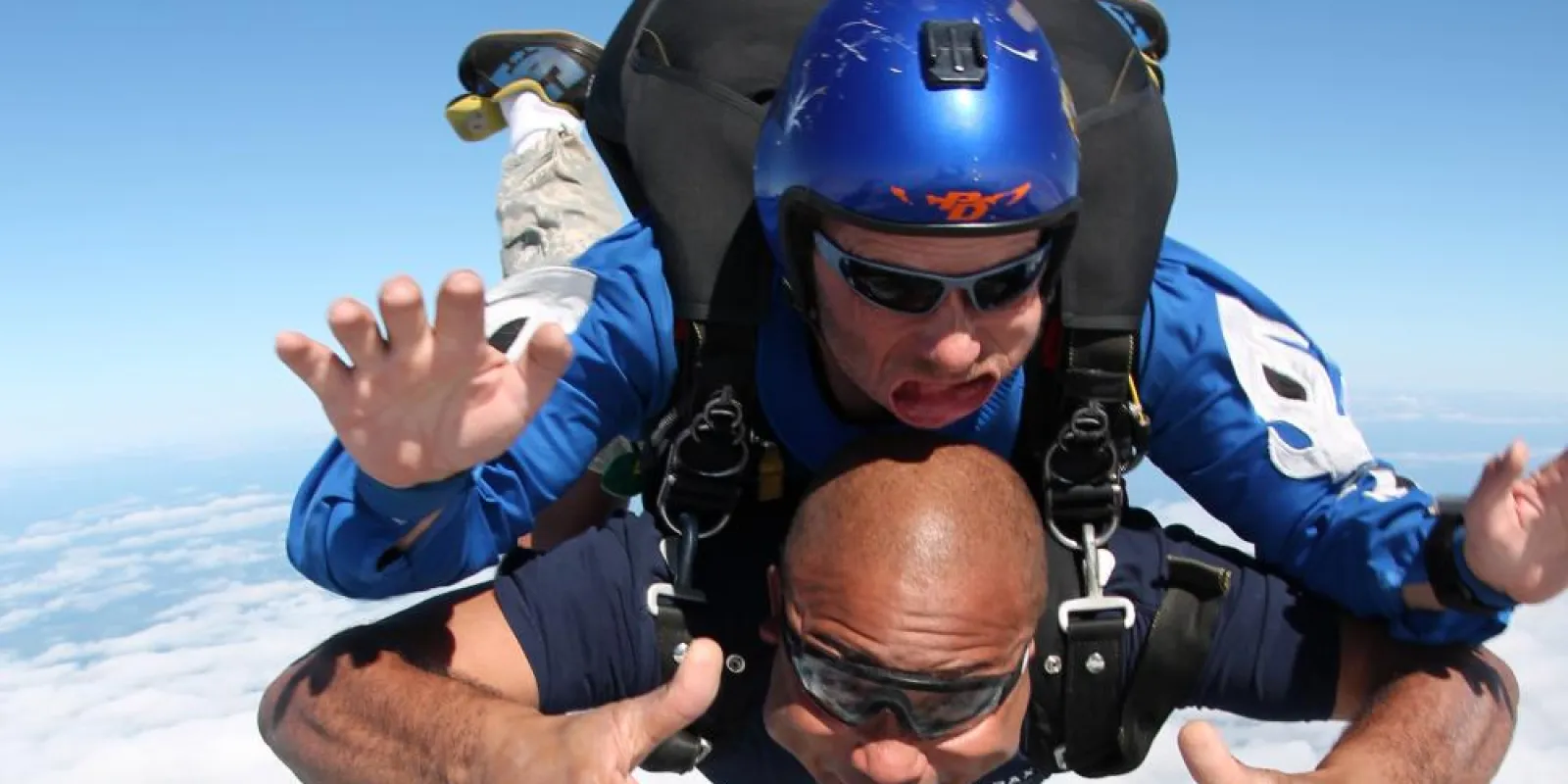 two people sky diving
