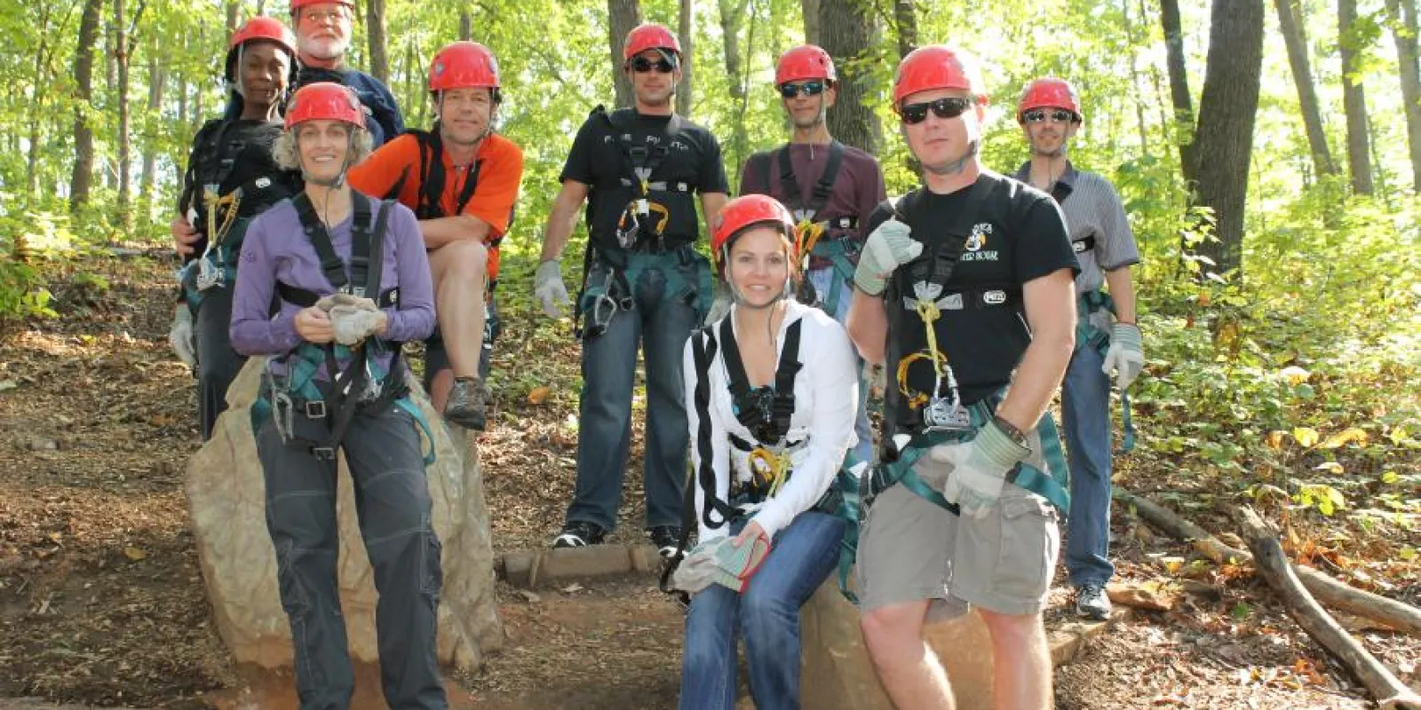 a group of people in a forest