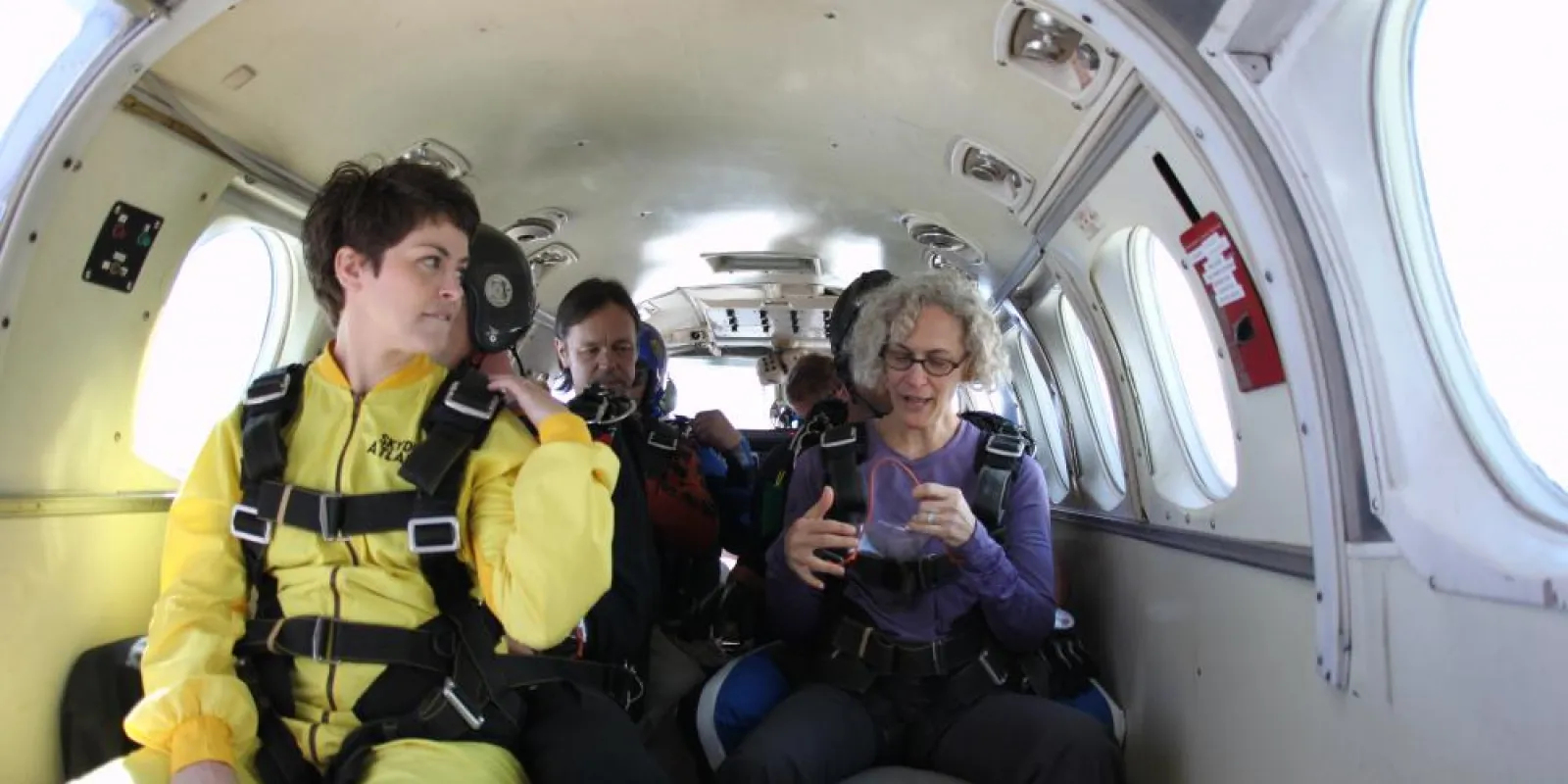 a group of people sitting in a plane
