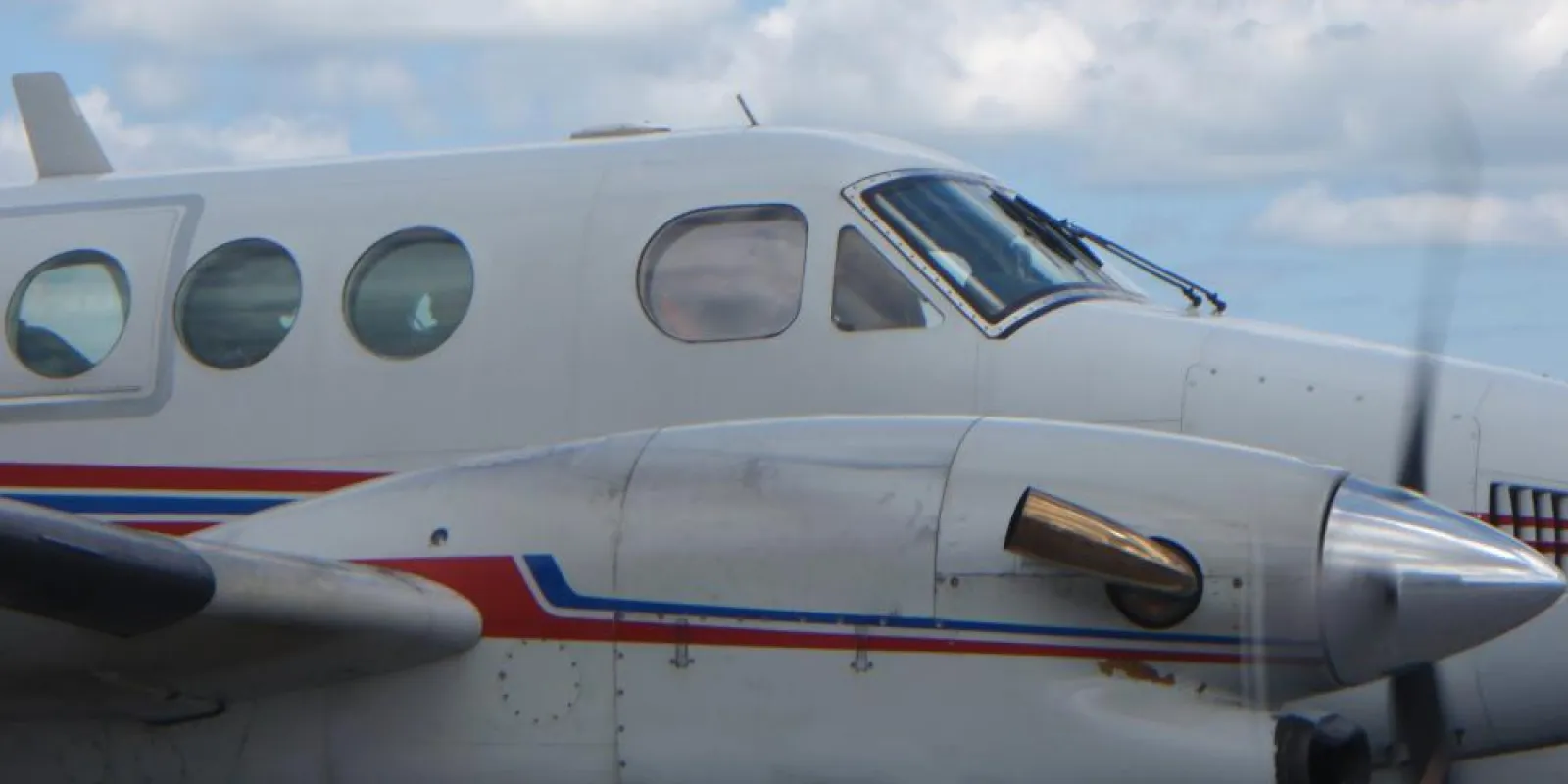 a passenger jet sitting on top of a runway