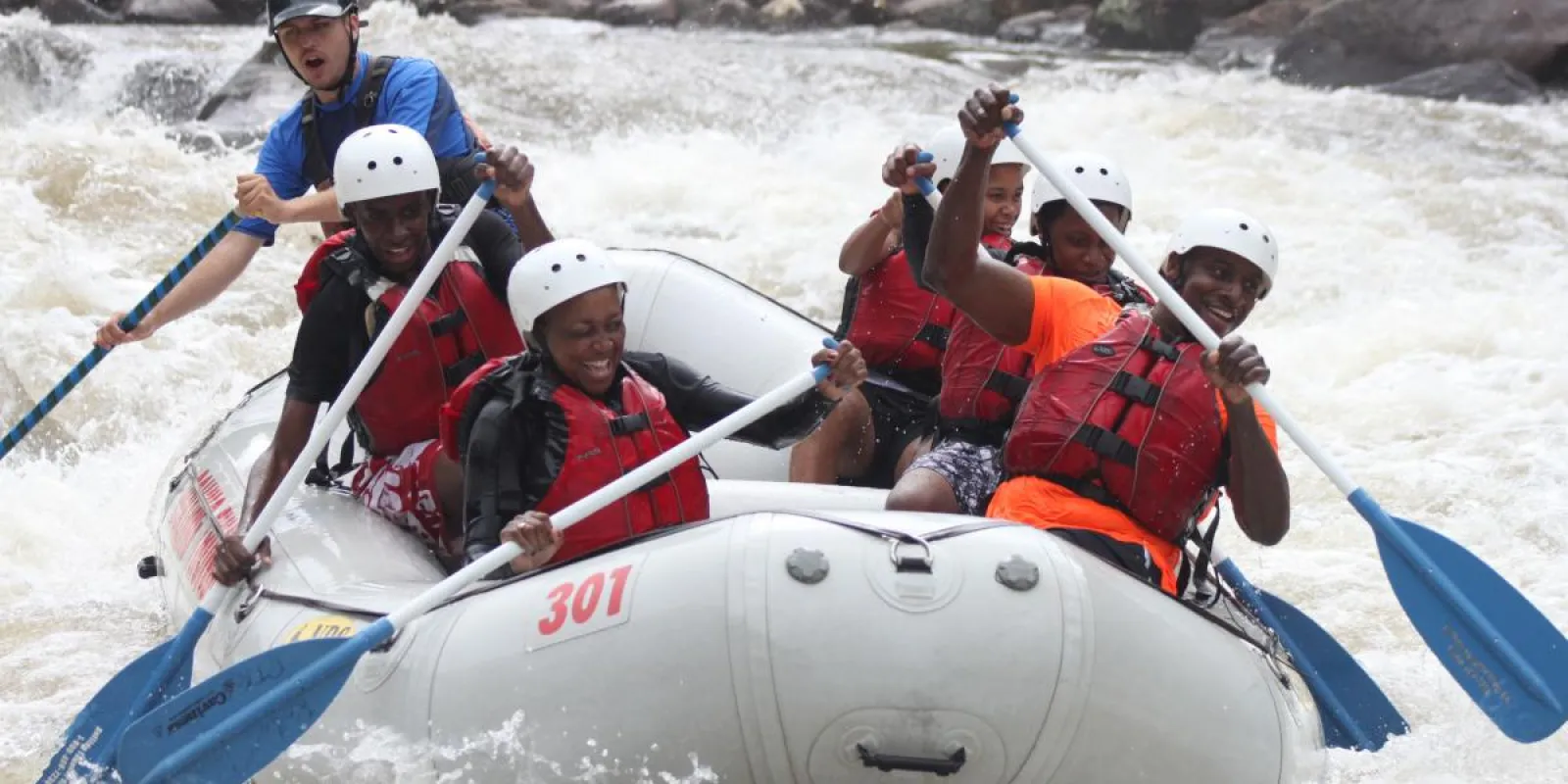 a group of people on a raft