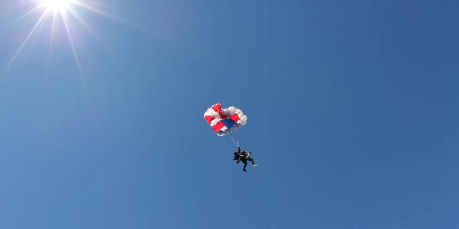 two people flying through the air