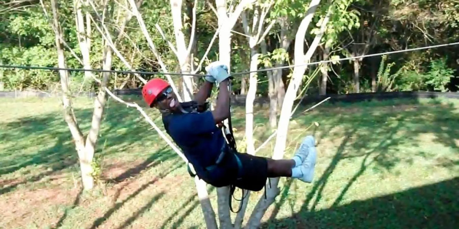 a man on a zip-line