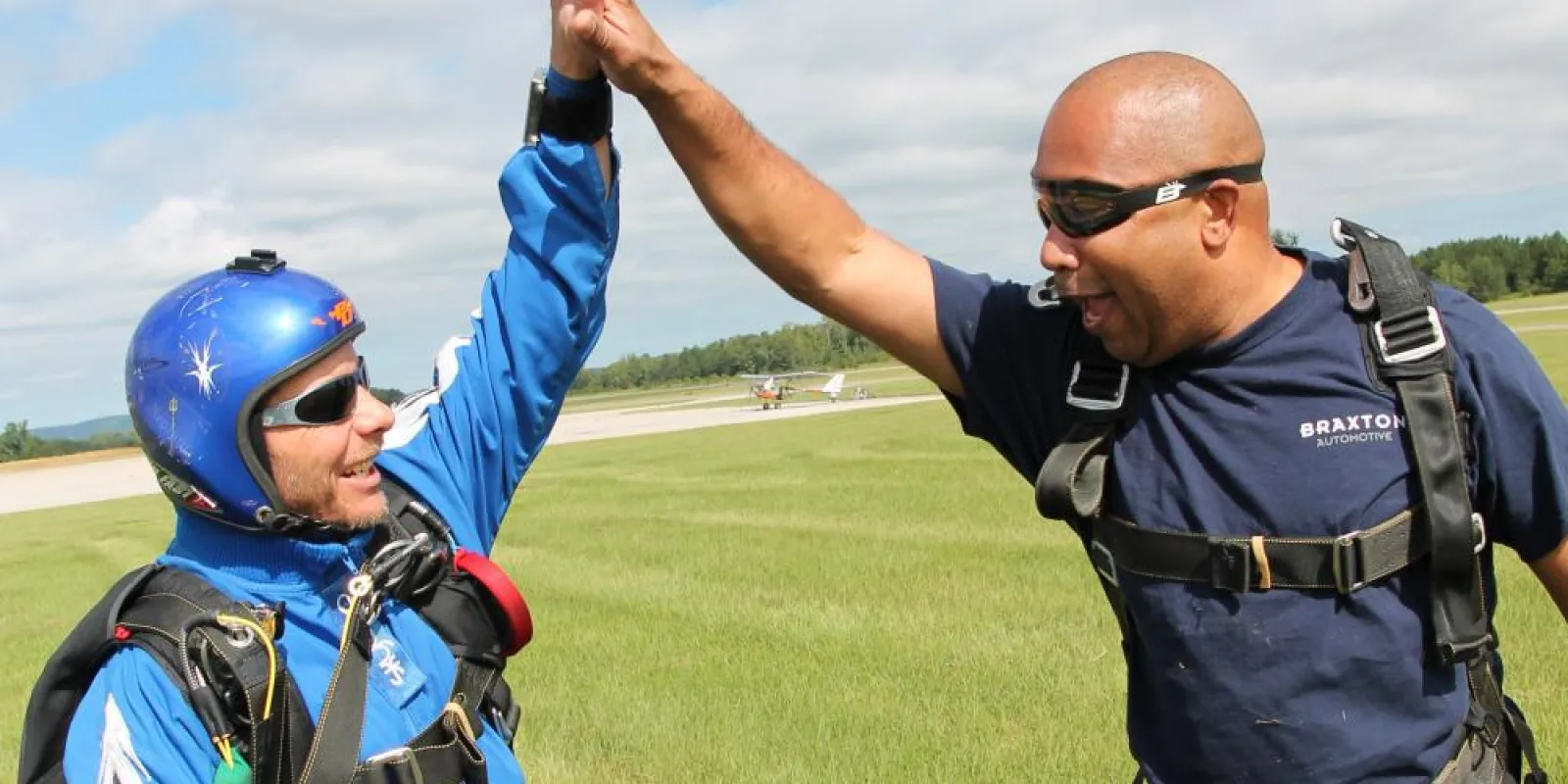 two people high-fiving