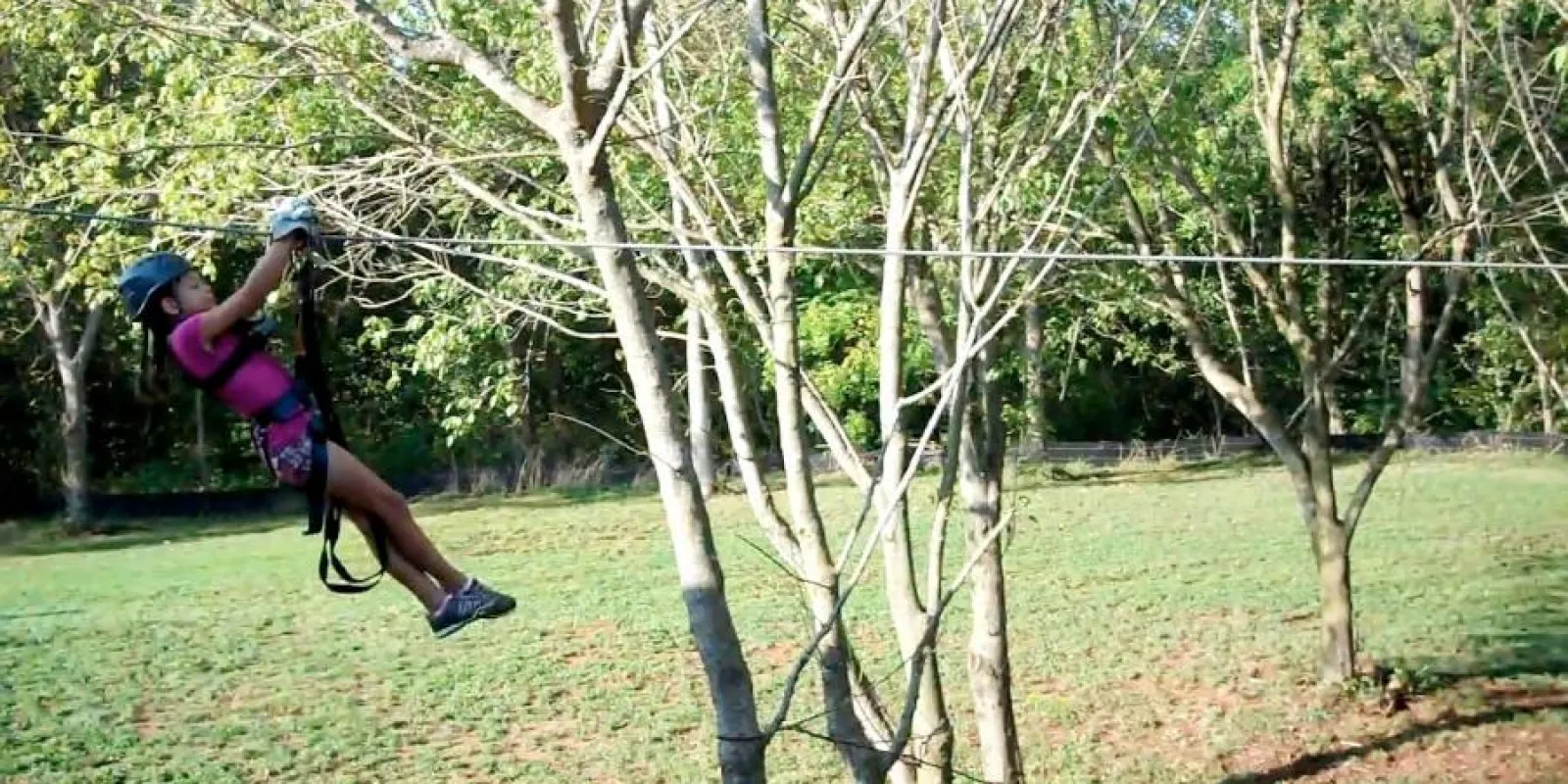 a person on a zip-line
