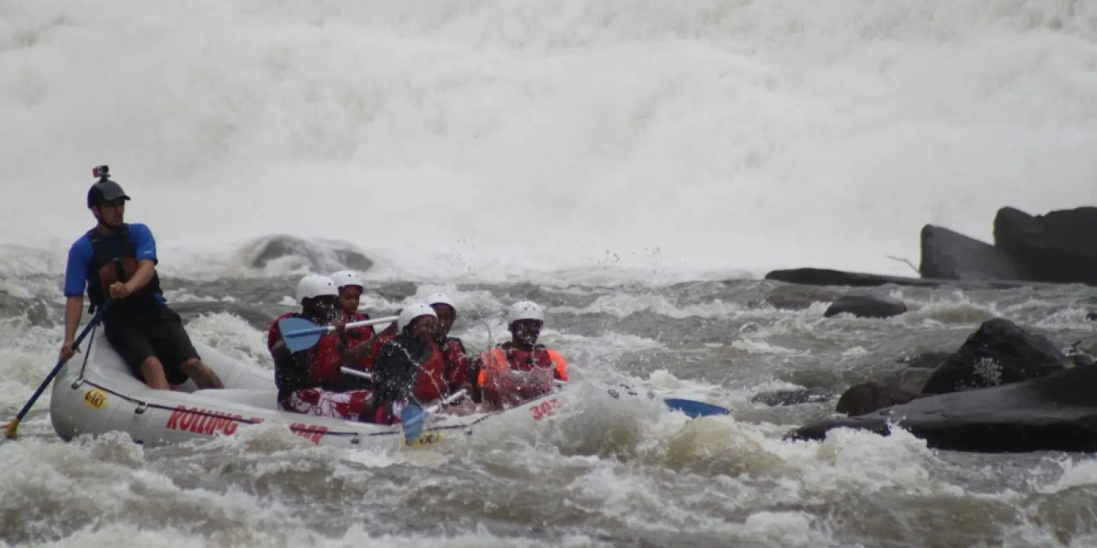 a group riding on the rapids