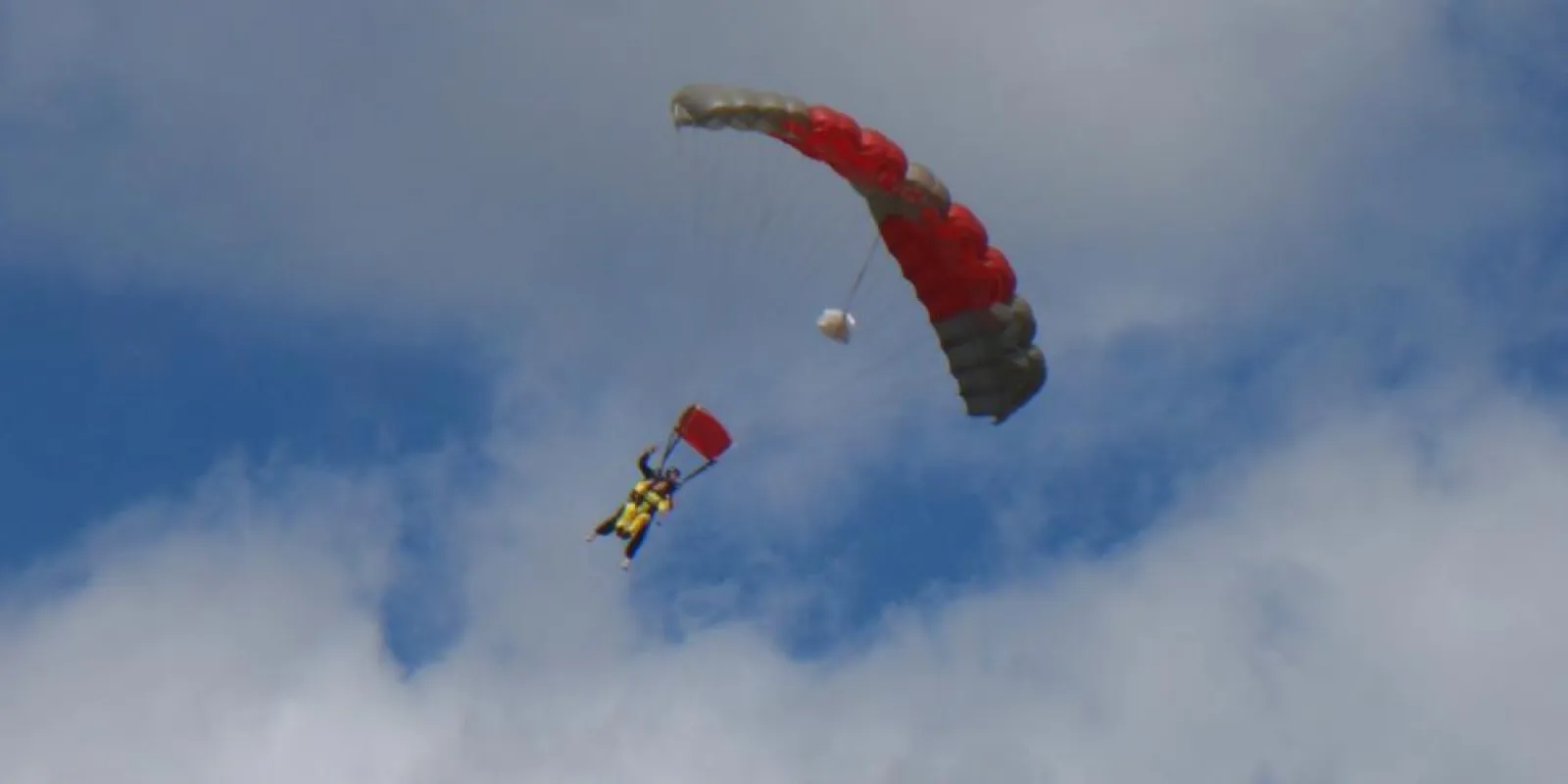 two people under a parachute