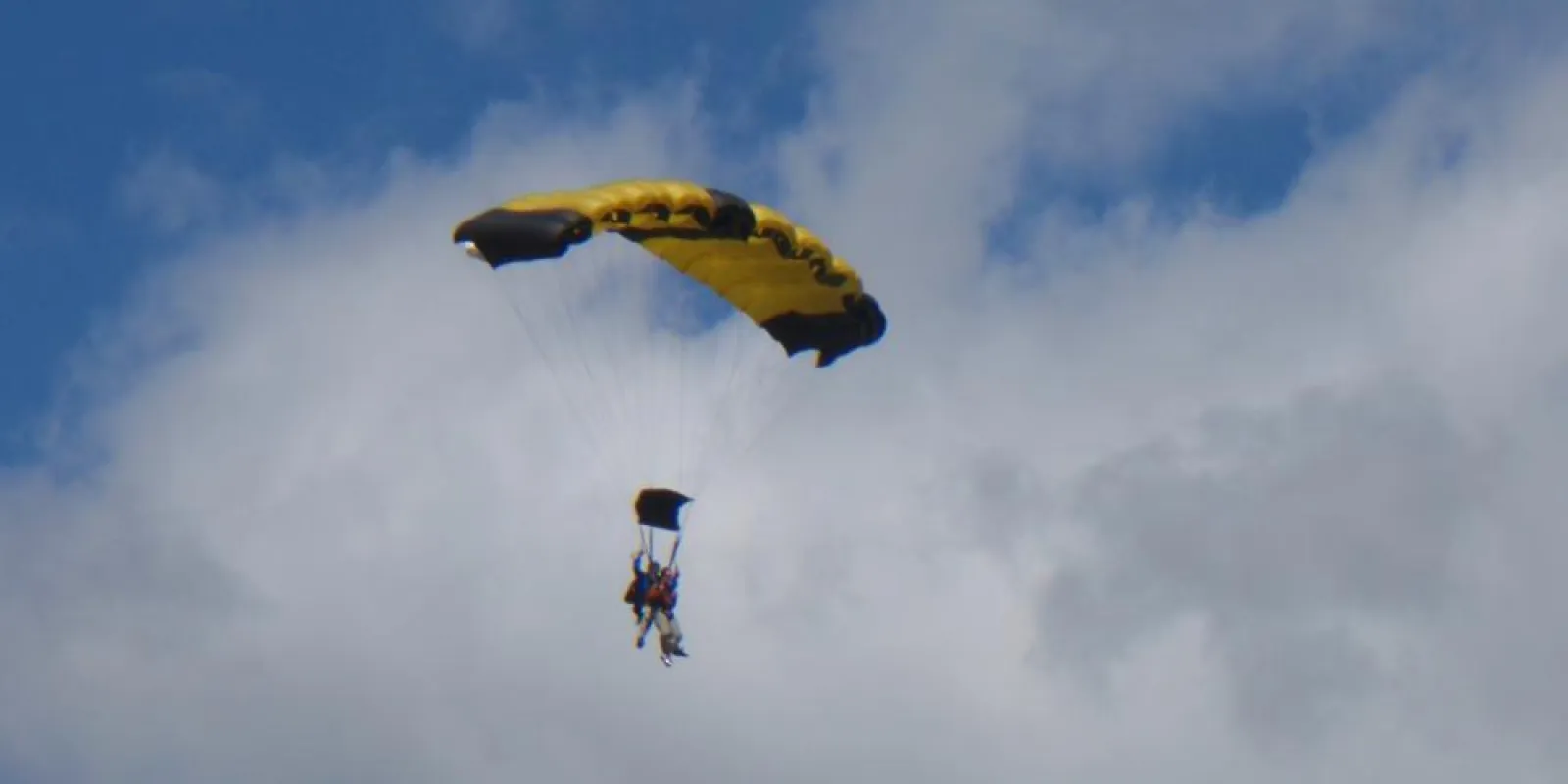 two people sky diving